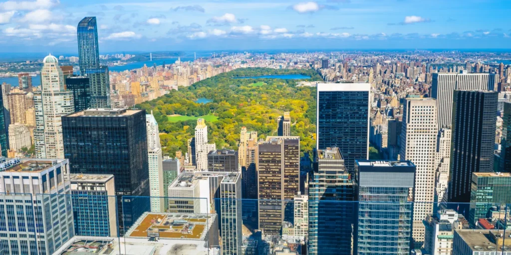 New York City skyline view featuring Central Park and skyscrapers. Great for city tours.
